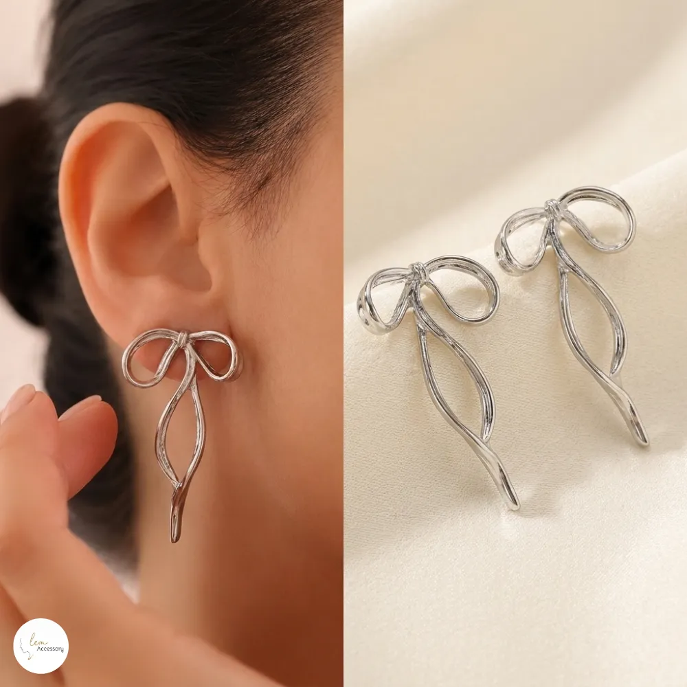 Minimal Fiyonk Figürlü Sallantılı Gümüş Renk Kadın Küpe